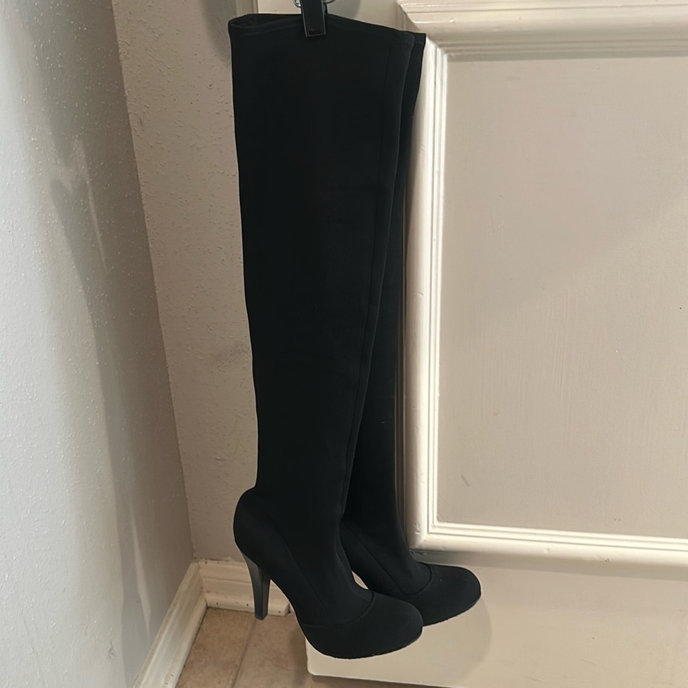 Report knee high boots